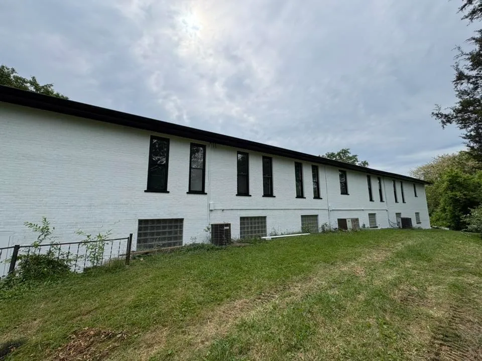 White commercial building exterior after repaint